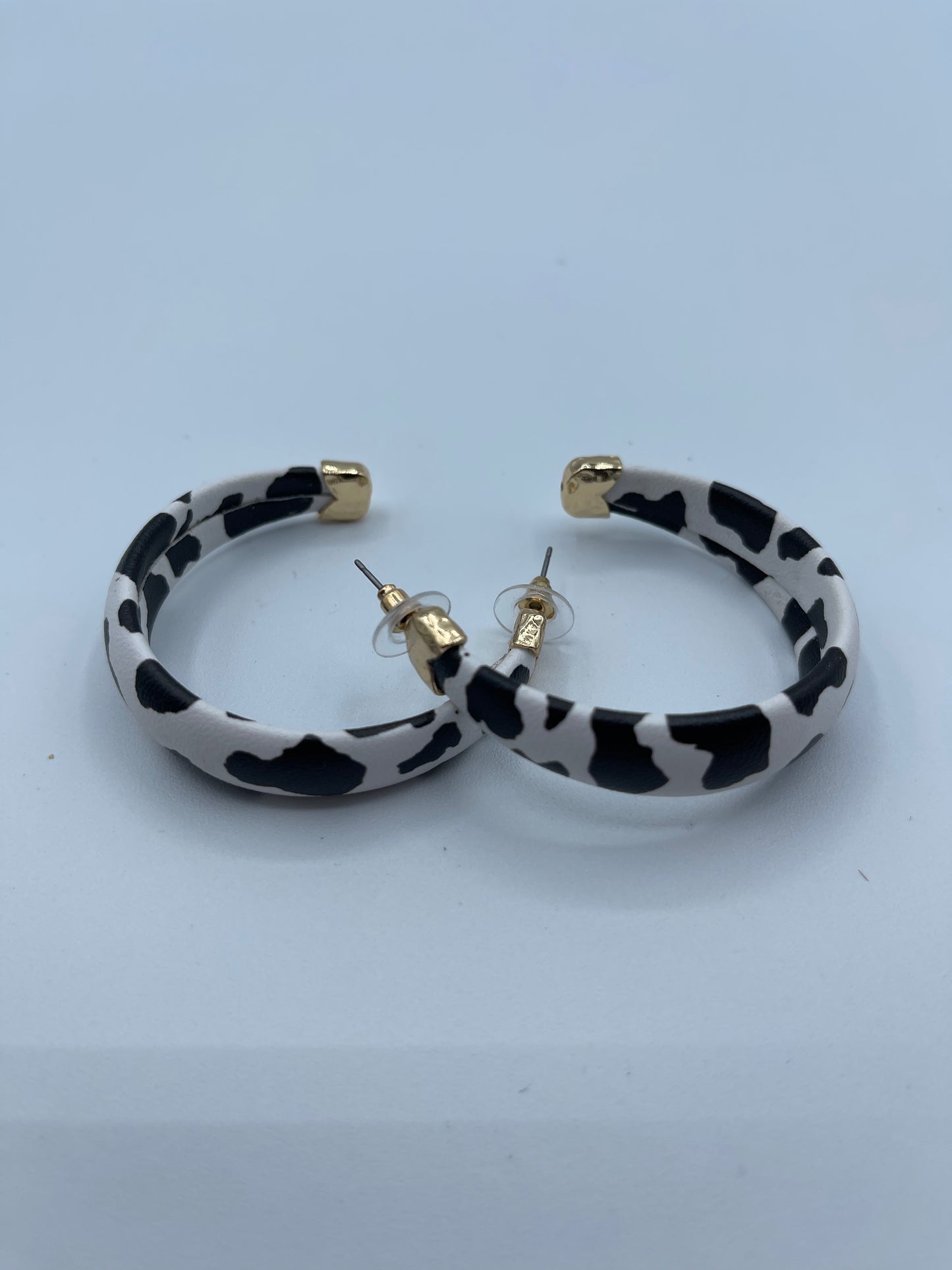 Black Cow Print Leather Hoops